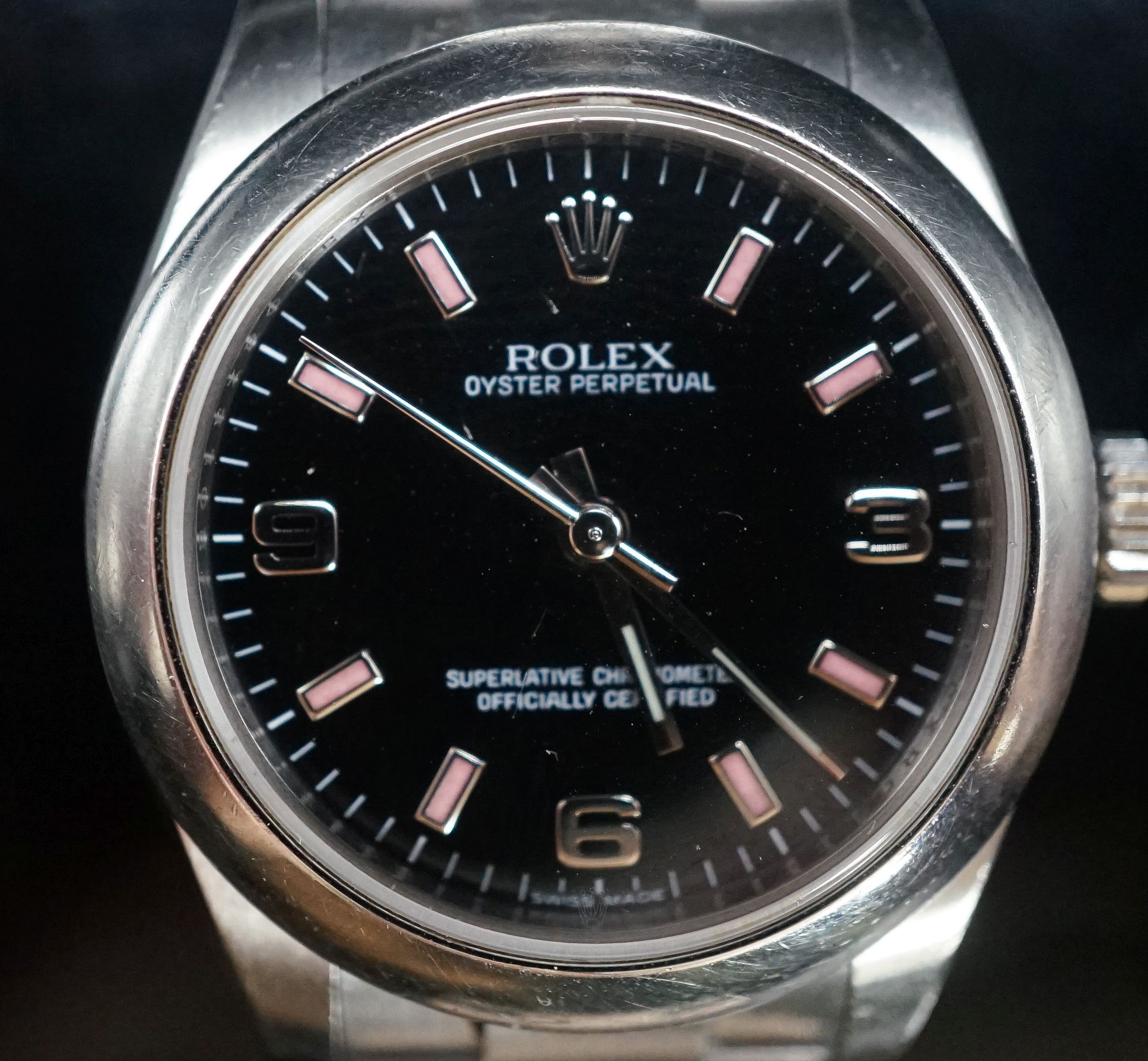 A lady's modern stainless steel Rolex Oyster Perpetual wrist watch, on a stainless steel Rolex bracelet, case diameter 31mm, no box or papers.